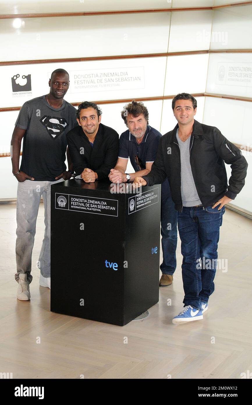 Omar Sy, Eric Toledano, François Cluzet and Olivier Nakache at the 59th International Film Festival of San Sebastian. (Credit: Julen Pascual Gonzalez) Stock Photo