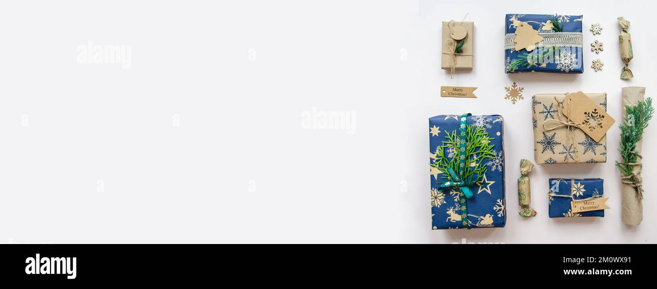 Eco friendly Christmas composition with gift boxes in craft reusable ...