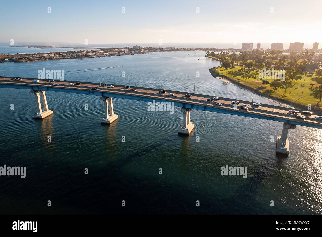 Aerial view of Coronado Bridge in San Diego bay in southern California on a warm sunny day with boats in the bay and cars crossing the bridge Stock Photo