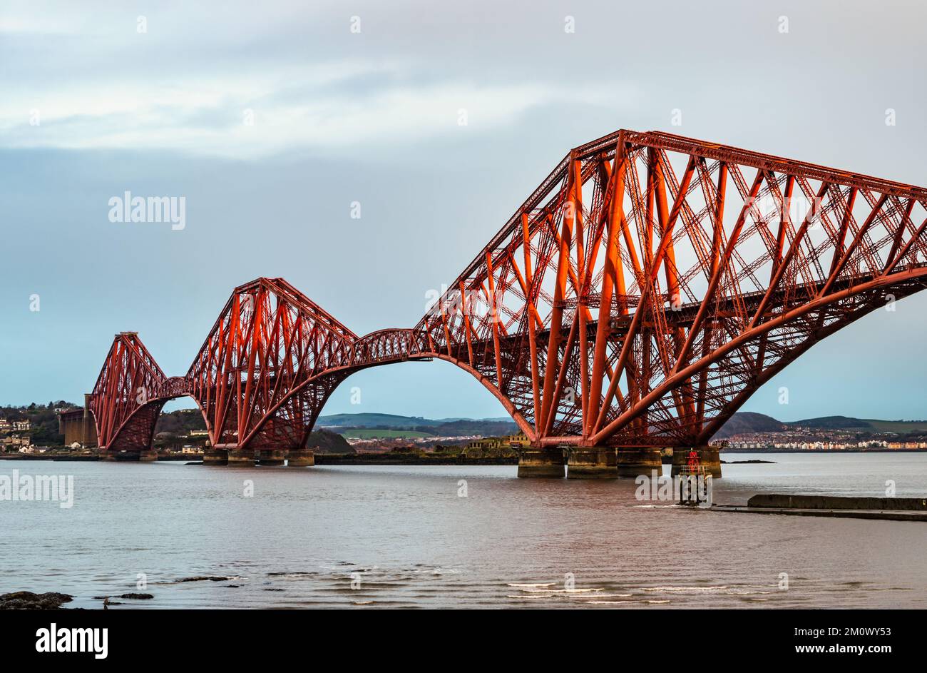 Iconic Forth Rail cantilever bridge in early morning light, Firth of Forth, Scotland, UK Stock Photo