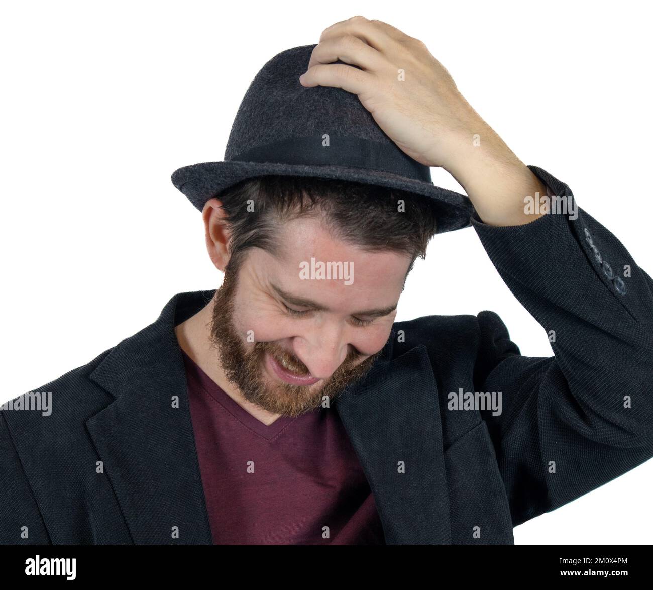 A handsome bearded male wearing a Fedora hat isolated on white ...