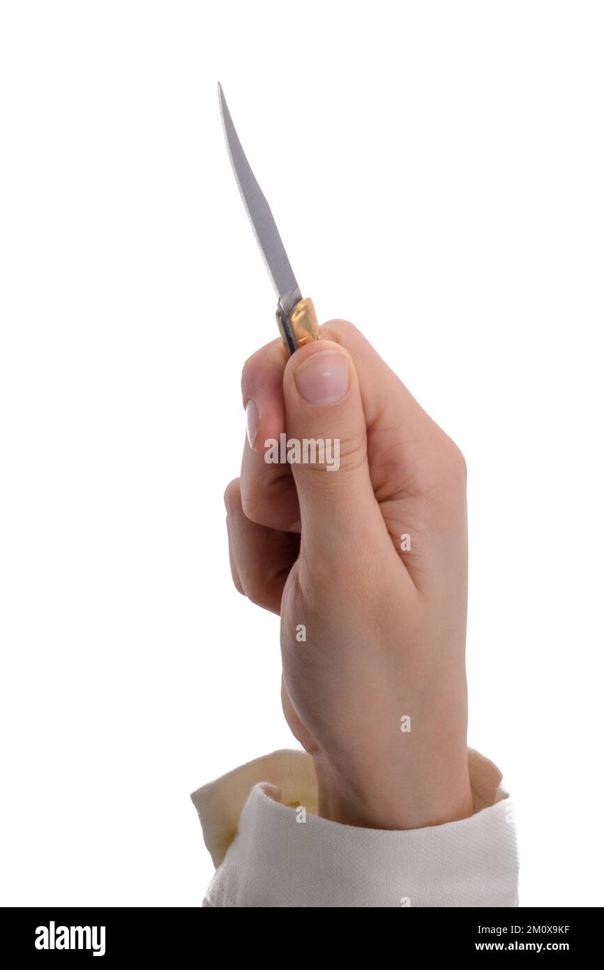 Hand holding a knife in hand on a white background Stock Photo