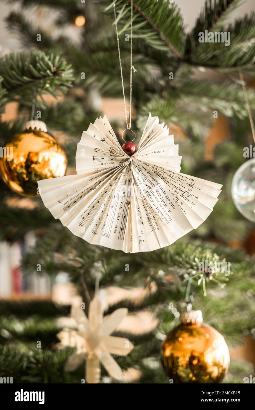 Handmade Christmas angel on christmas tree, papercraft Stock Photo Alamy