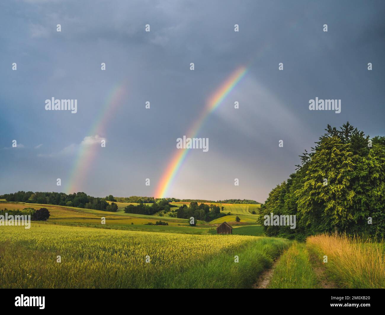Double Rainbow over rural landscape in bavaria Stock Photo - Alamy