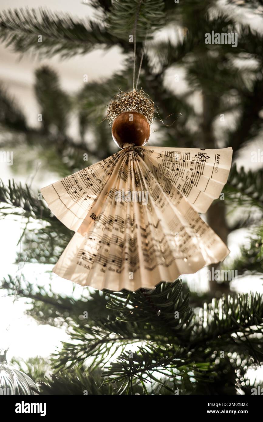 Handmade Christmas angel on christmas tree, papercraft Stock Photo Alamy