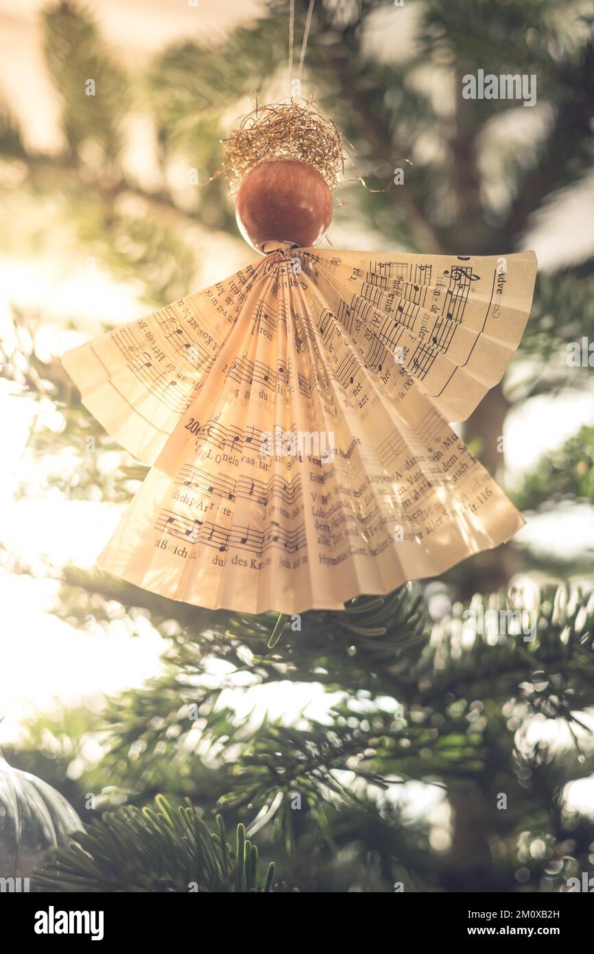 Handmade Christmas angel on christmas tree, papercraft Stock Photo Alamy
