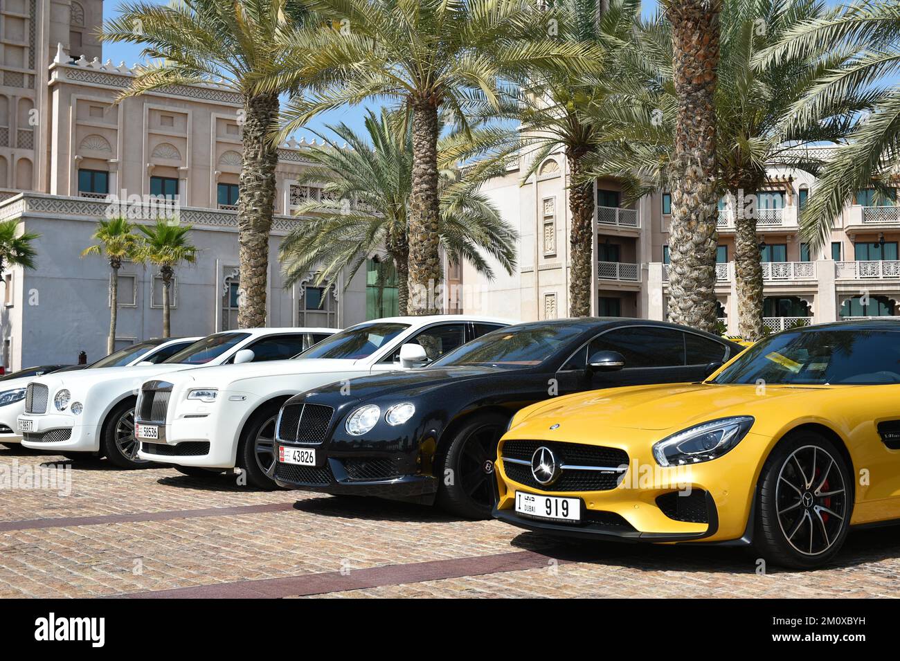 Luxury cars at the entrance of the Madinat Jumeirah Resort in Dubai