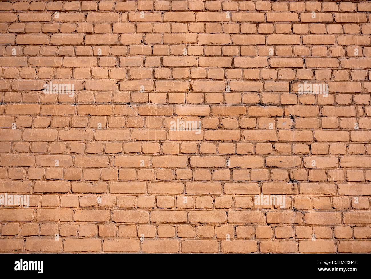 Old red wall from brickwork as background horizontal view closeup Stock Photo
