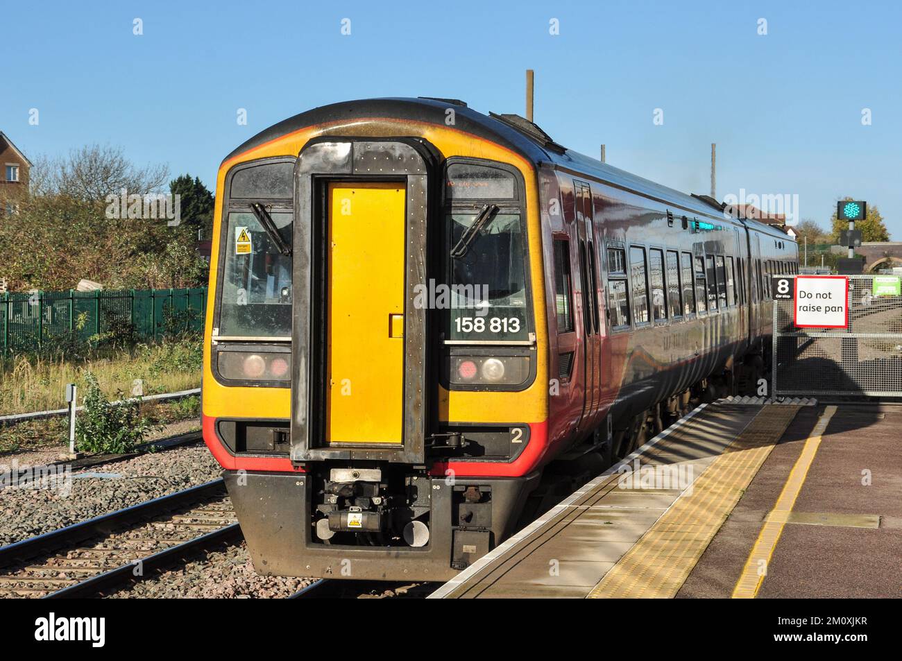 Class 158 Express Sprinter DMU leaving the platform at Peterborough, Cambridgeshire, England, UK Stock Photo