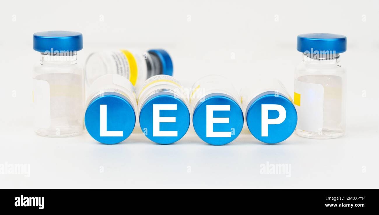 Medicine and health concept. On the blue roofs of the injections it says - LEEP Stock Photo