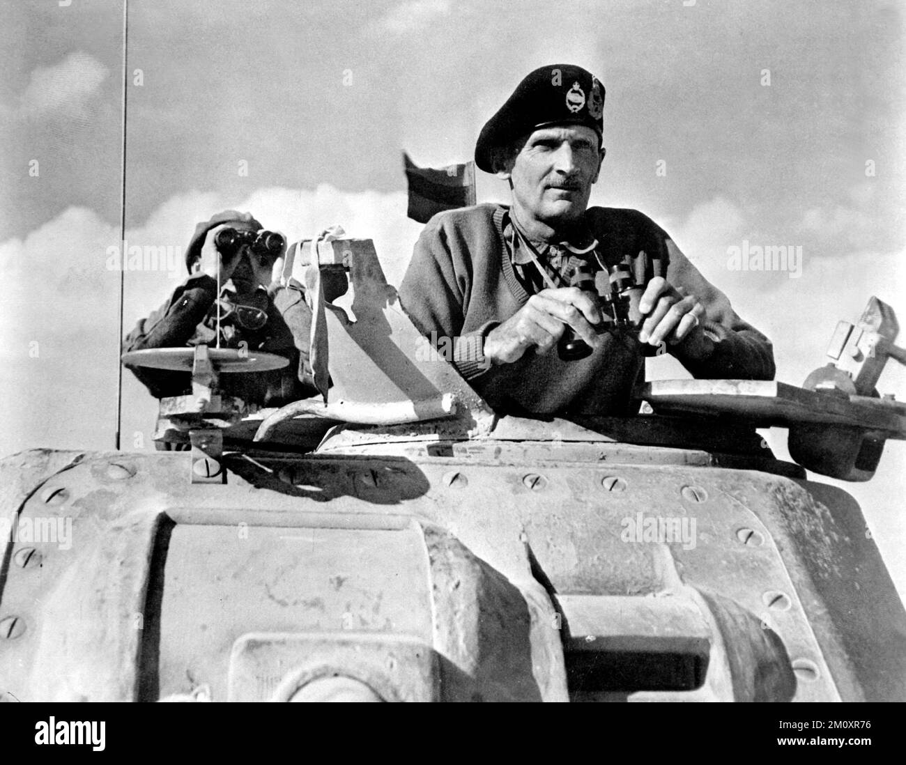 Montgomery in a Grant tank in North Africa, November 1942. Monty, General Montgomery, General Sir Bernard Montgomery in England, 1943 Portrait of the Commander of the Eighth Army General Sir Bernard Montgomery taken during a visit to England. Field Marshal Bernard Law Montgomery, 1st Viscount Montgomery of Alamein, (1887 – 1976), nicknamed "Monty", was a senior British Army officer who served in the First World War, the Irish War of Independence and the Second World War Stock Photo