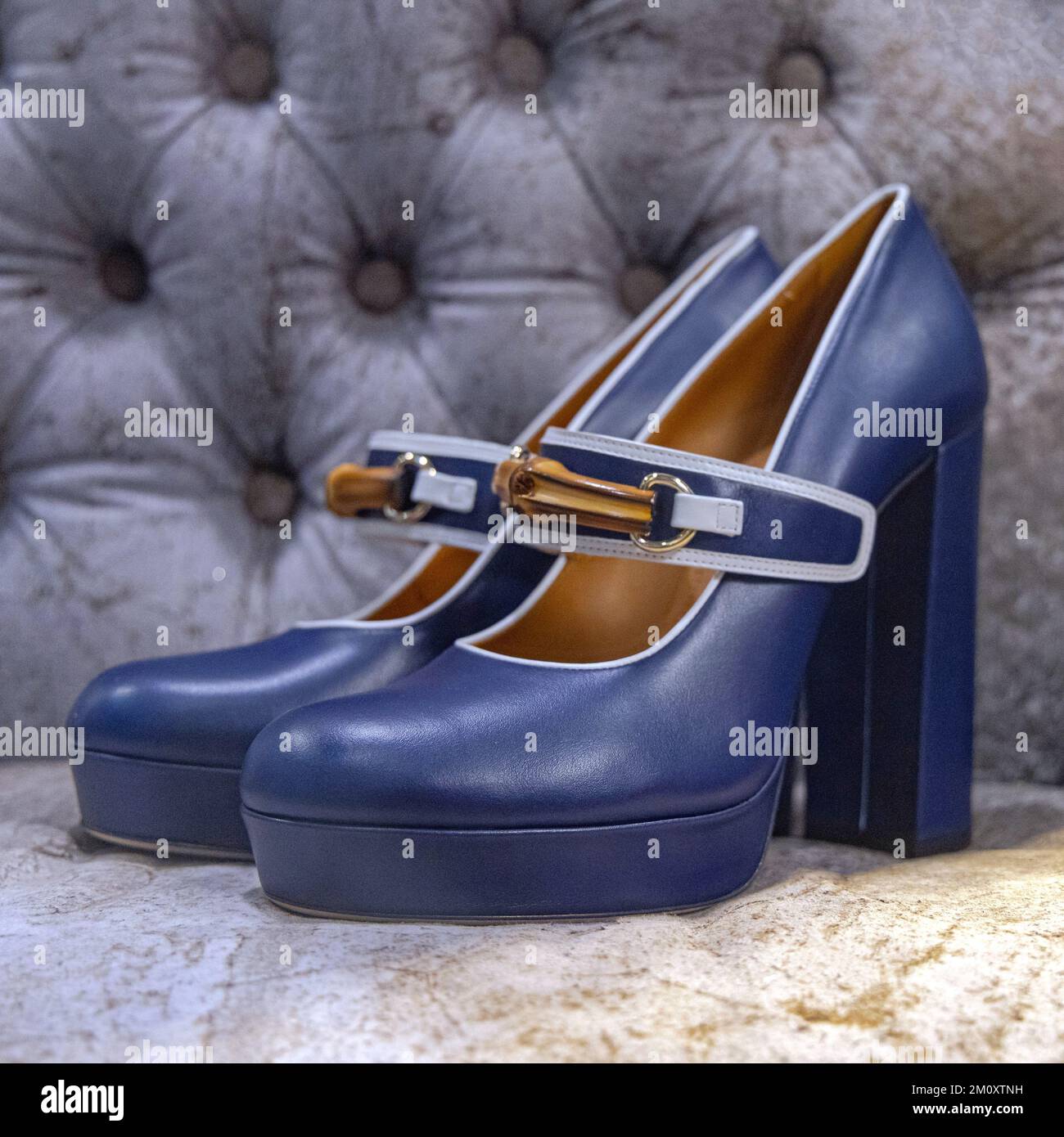 Pair of Stylish Navy Blue Platform Shoes at Sofa Stock Photo - Alamy