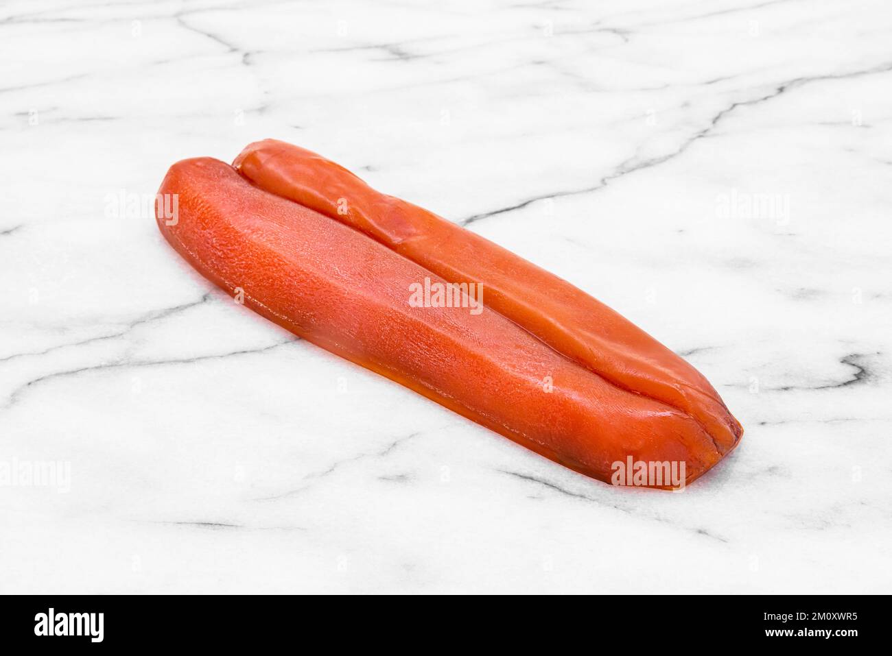 Closeup of a bottarga, dried mullet fish roe Stock Photo Alamy