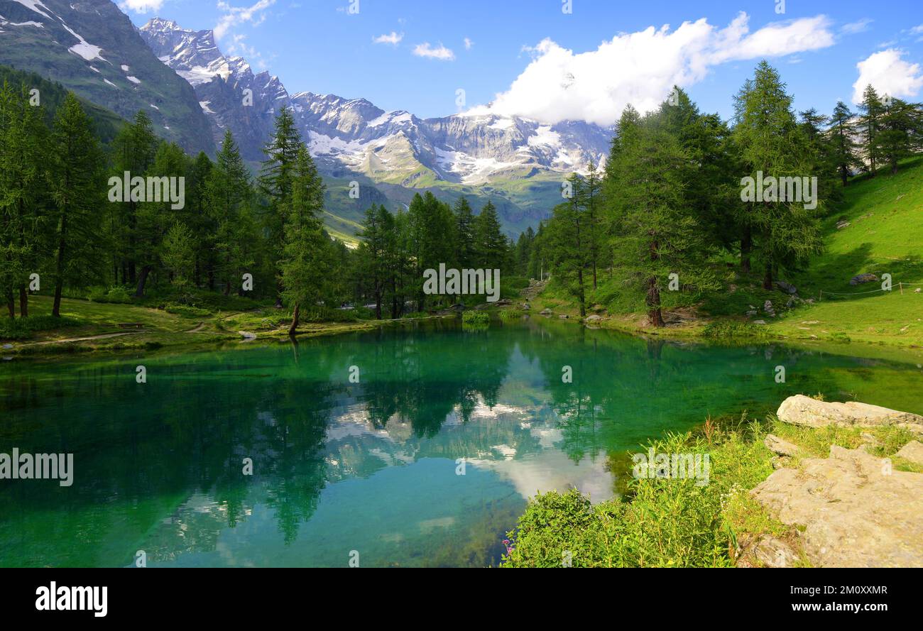 View of the lake Lago Blu near Breuil-Cervinia, Val D'Aosta,Italy. Beautiful mountain landscape in sunny day. Stock Photo