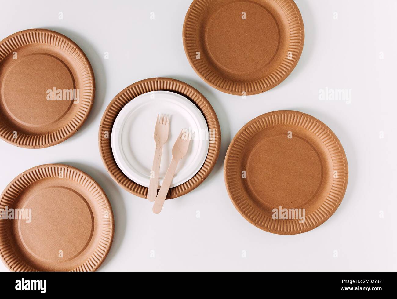 Eco craft disposable tableware from wood and recycle paper. Plates and