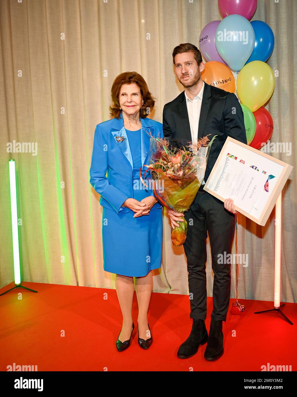 STOCKHOLM 20221208Sweden's Queen Silvia and the winner of the Childhood Prize Andreas Carlson, a youth recreation leader at a school in Sundsvall, dur Stock Photo