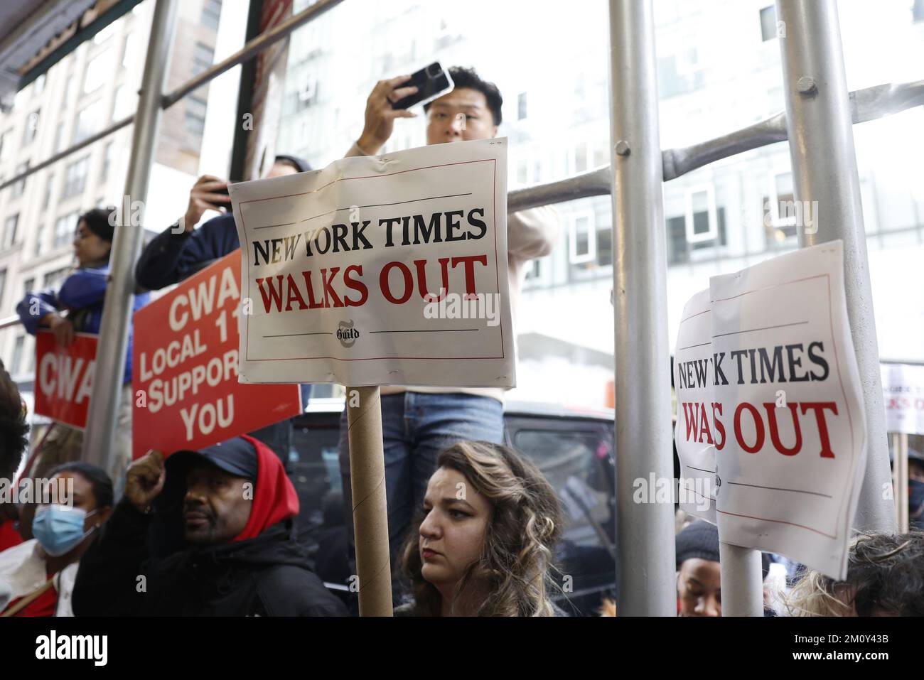 New York, United States. 08th Dec, 2022. New York Times employees hold up signs after a walk out of the New York Times offices when they hold a one day strike in New York City on Thursday, December 8, 2022. Reporters and editors at The New York Times began a one-day strike on Thursday due to contract disputes. Photo by John Angelillo/UPI Credit: UPI/Alamy Live News Stock Photo