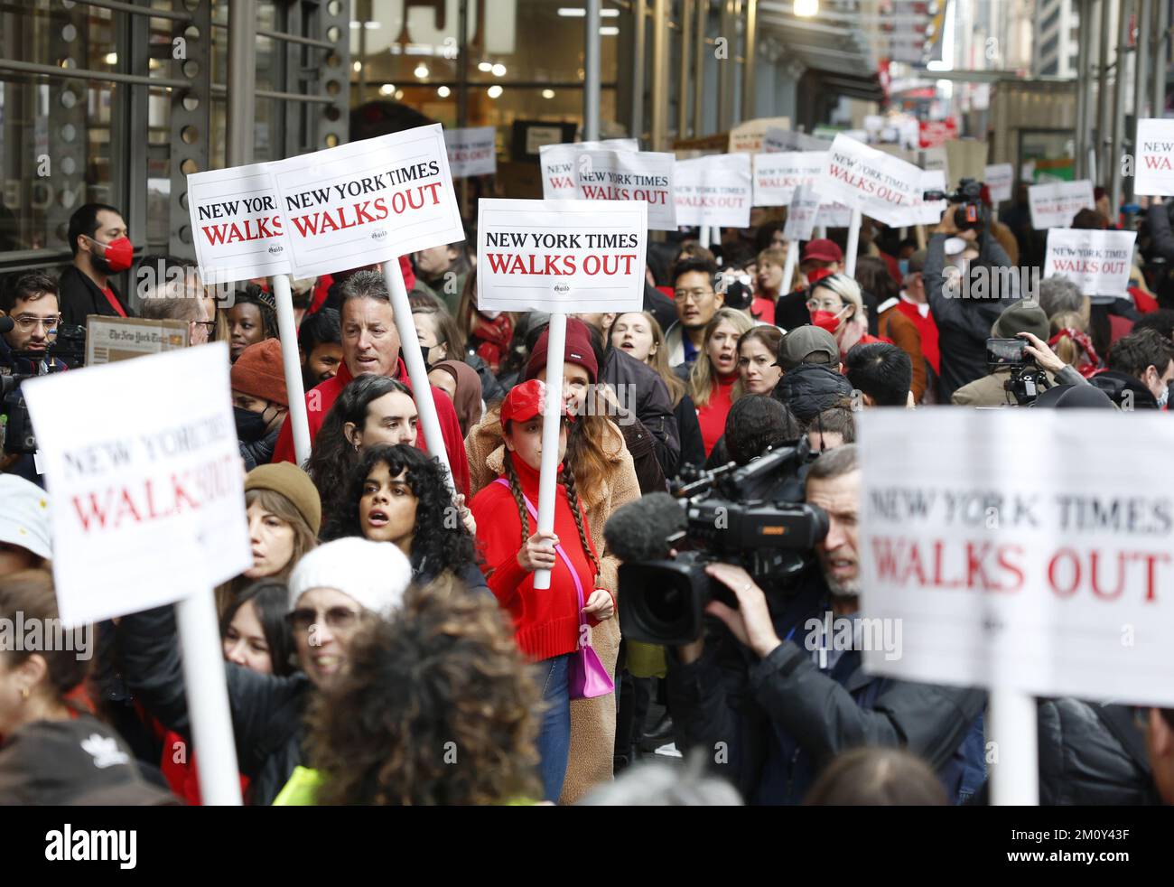 New York, United States. 08th Dec, 2022. New York Times employees hold up signs after a walk out of the New York Times offices when they hold a one day strike in New York City on Thursday, December 8, 2022. Reporters and editors at The New York Times began a one-day strike on Thursday due to contract disputes. Photo by John Angelillo/UPI Credit: UPI/Alamy Live News Stock Photo