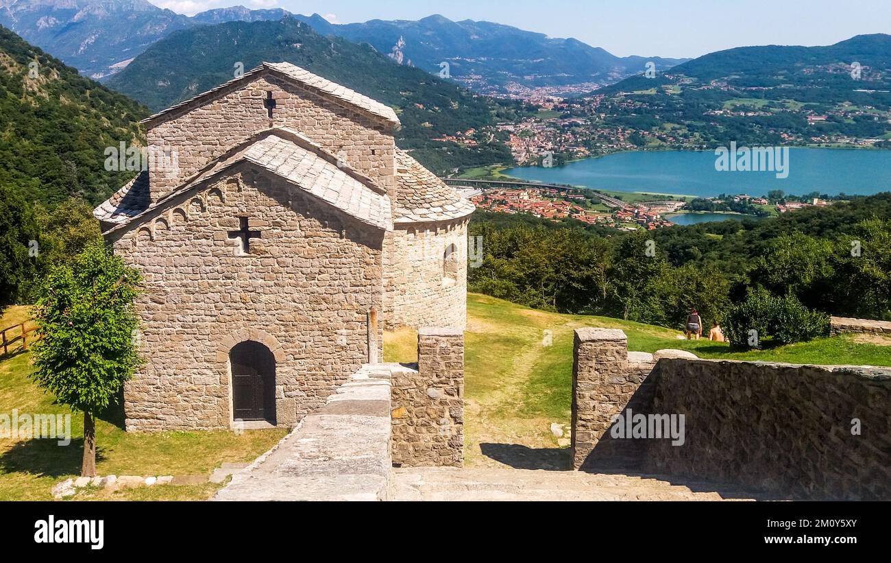 Abbey of San Pietro al Monte, medieval monastic complex dating to 11th century, Lombard Romanesque style, on a hill outside the town of Civate, Italy Stock Photo