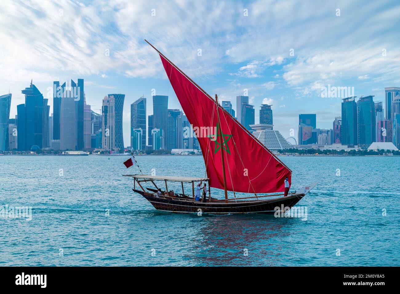 Dhow Boat on Corniche with Moroccan Flag. FIFA Qatar World Cup 2022 Stock Photo