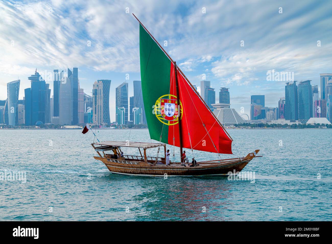Dhow Boat at Corniche beach with Portugal Flag. FIFA Qatar World Cup 2022 Stock Photo