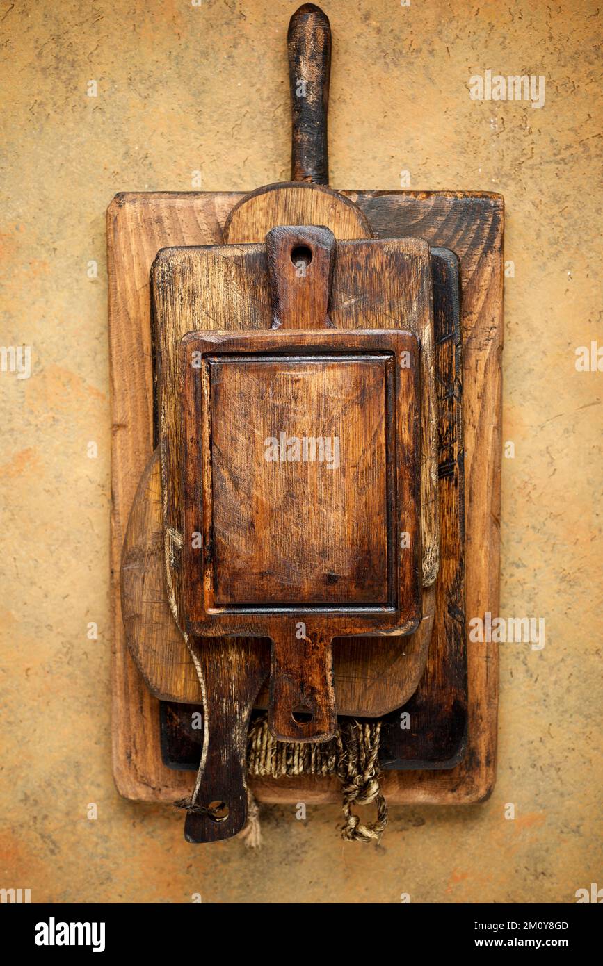Stacked kitchen cutting boards view. Stock Photo