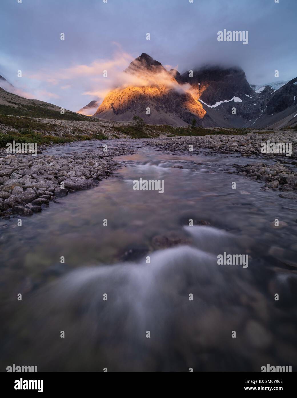 River and mountain on hike to Blåvatnet lake, Norway Stock Photo