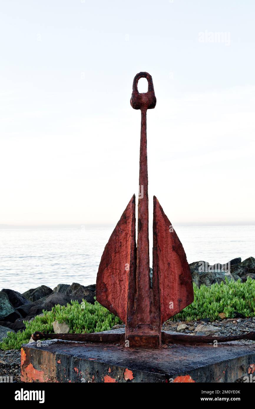 Classic 'Danforth'   fluke-style boat anchor,  overlooking Pacific Ocean. Stock Photo