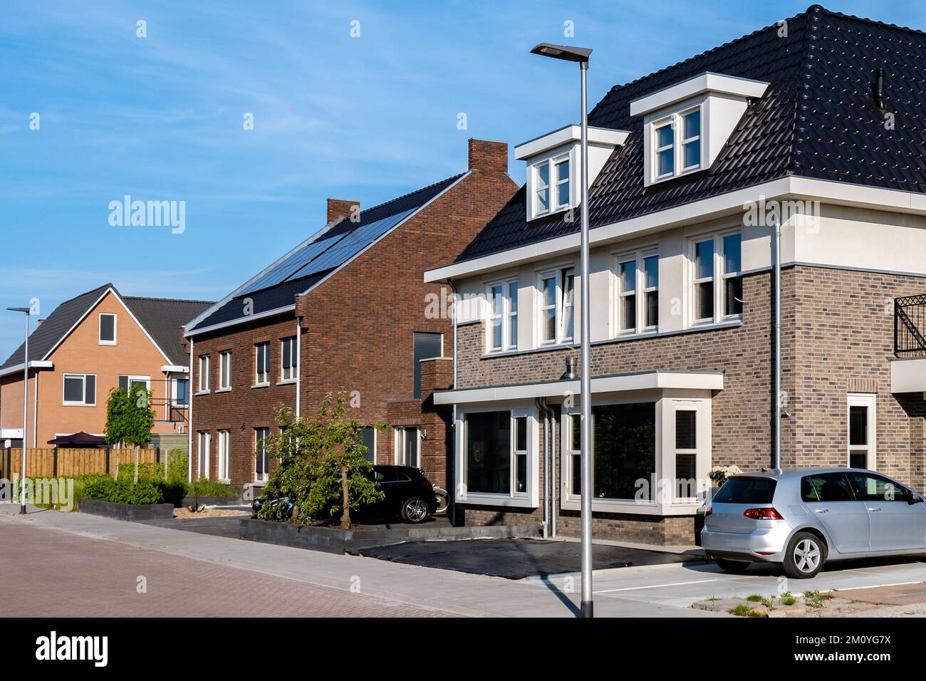 Dutch Suburban area with modern family houses, newly build modern family homes in the