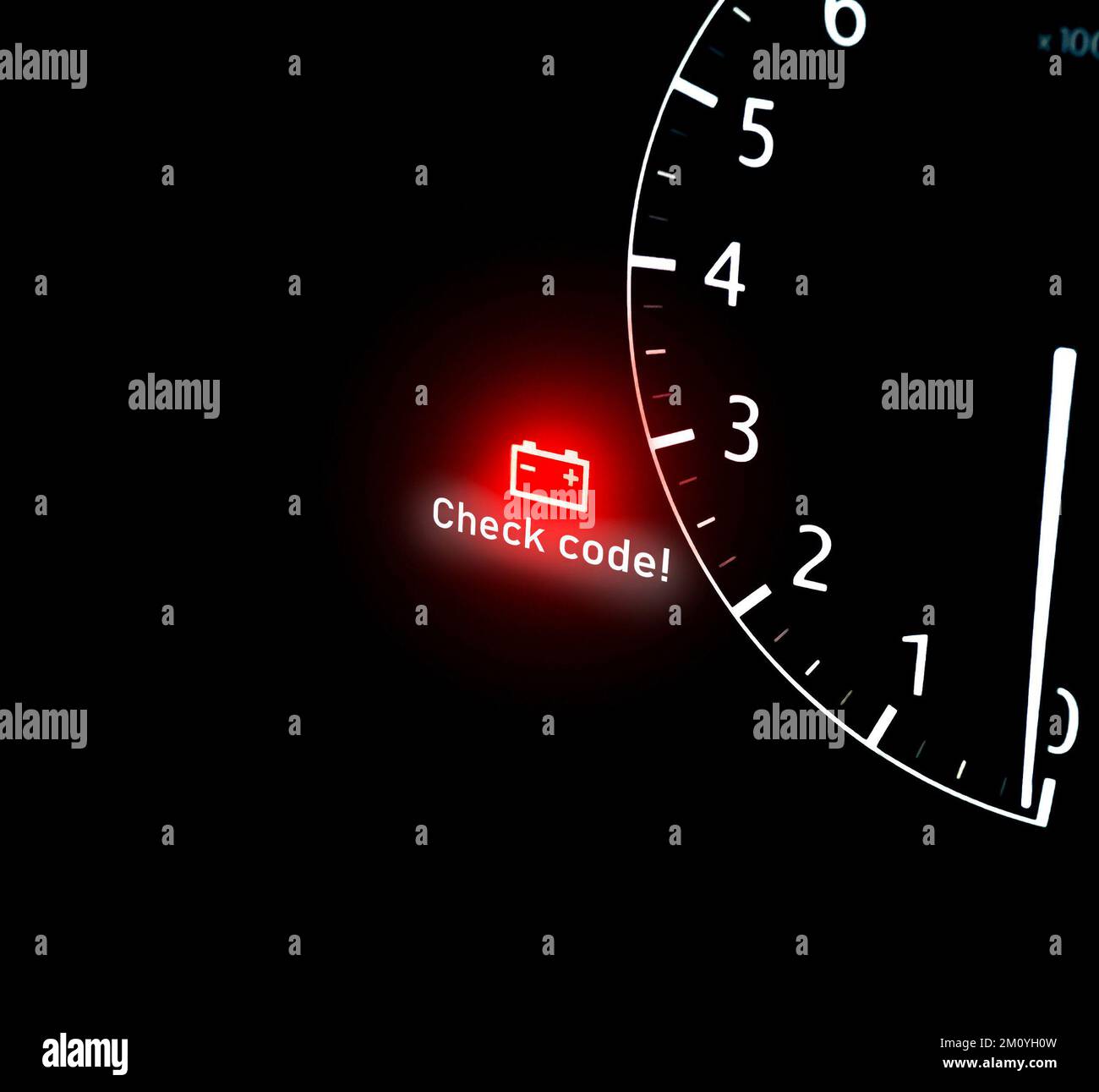 Battery warning light on car dashboard with copy space below on black