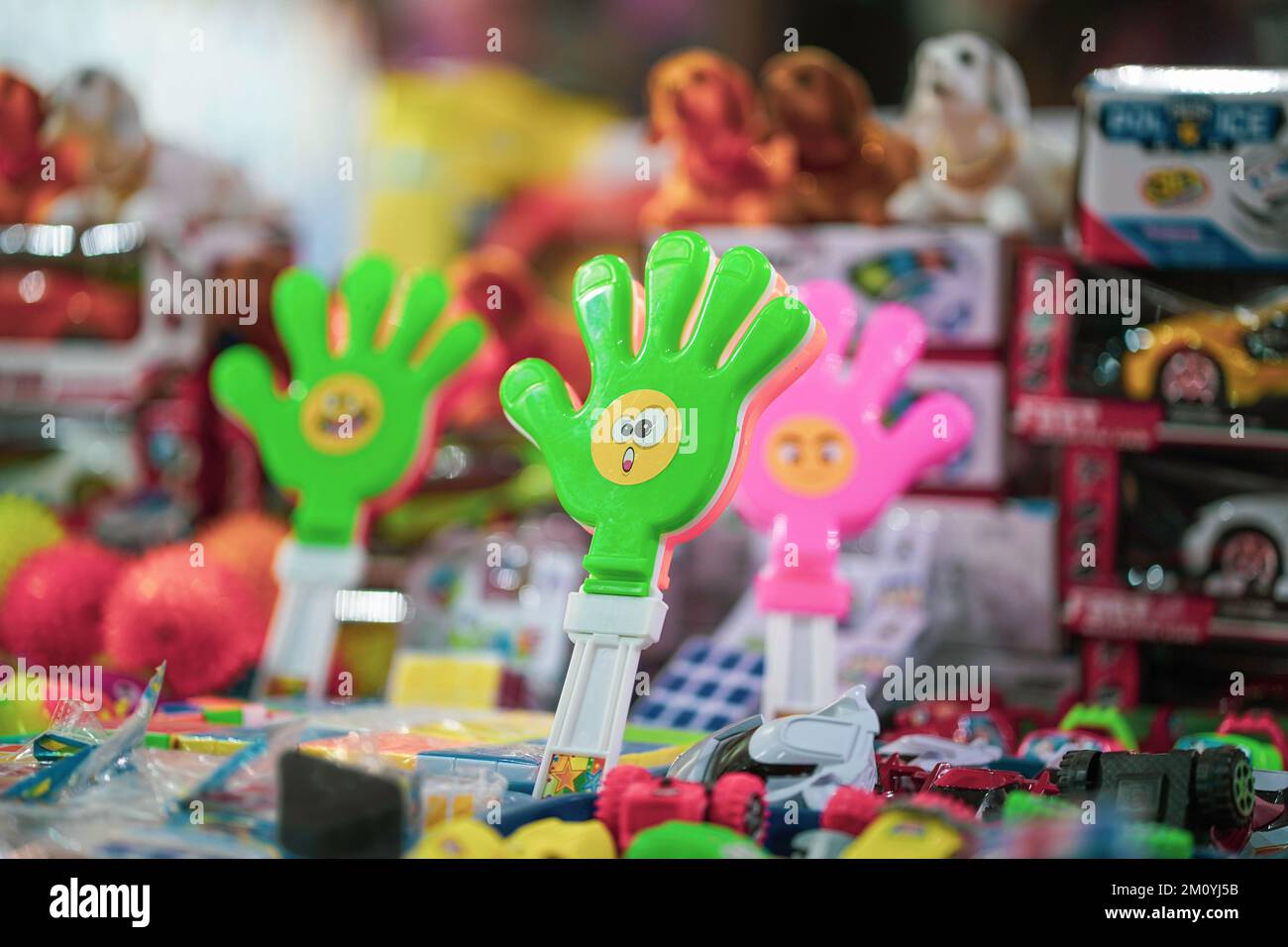 A Hand shaped clap hand toy in green color, children toys in green