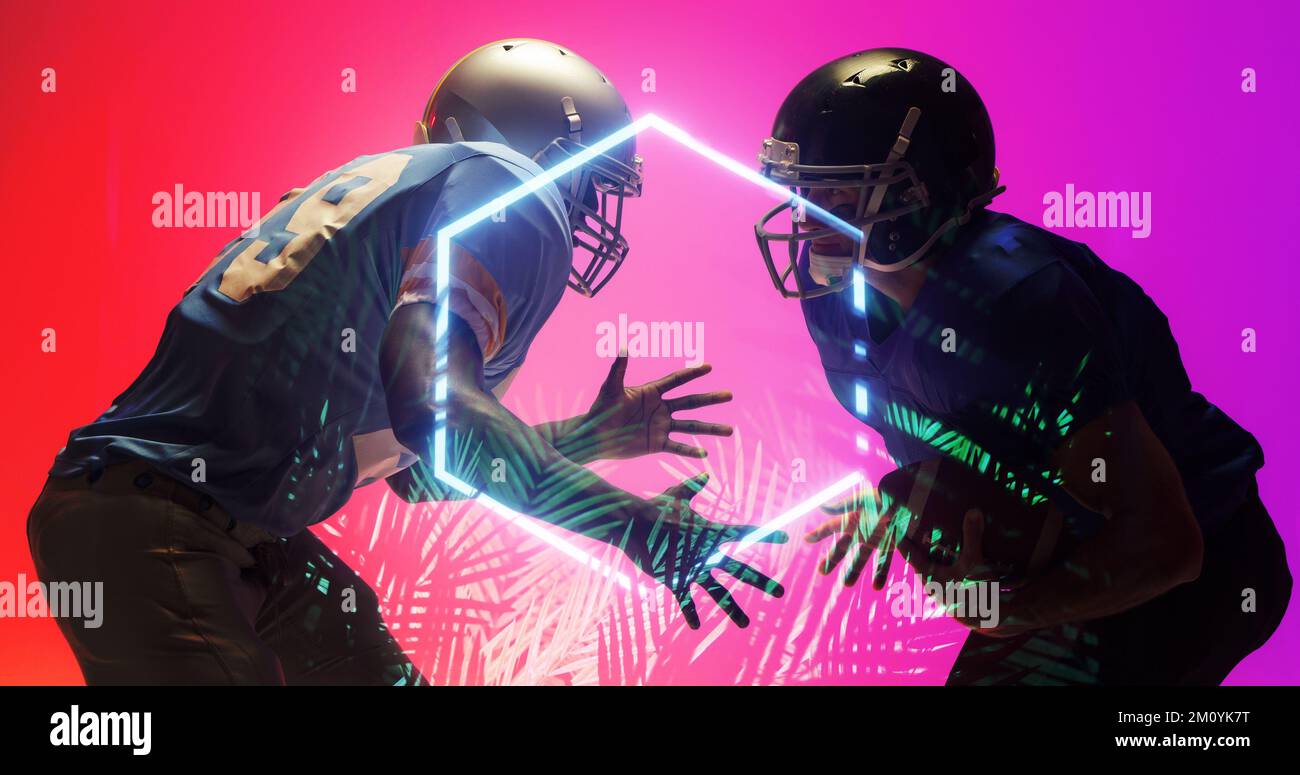 American football players wearing helmets standing face to face by