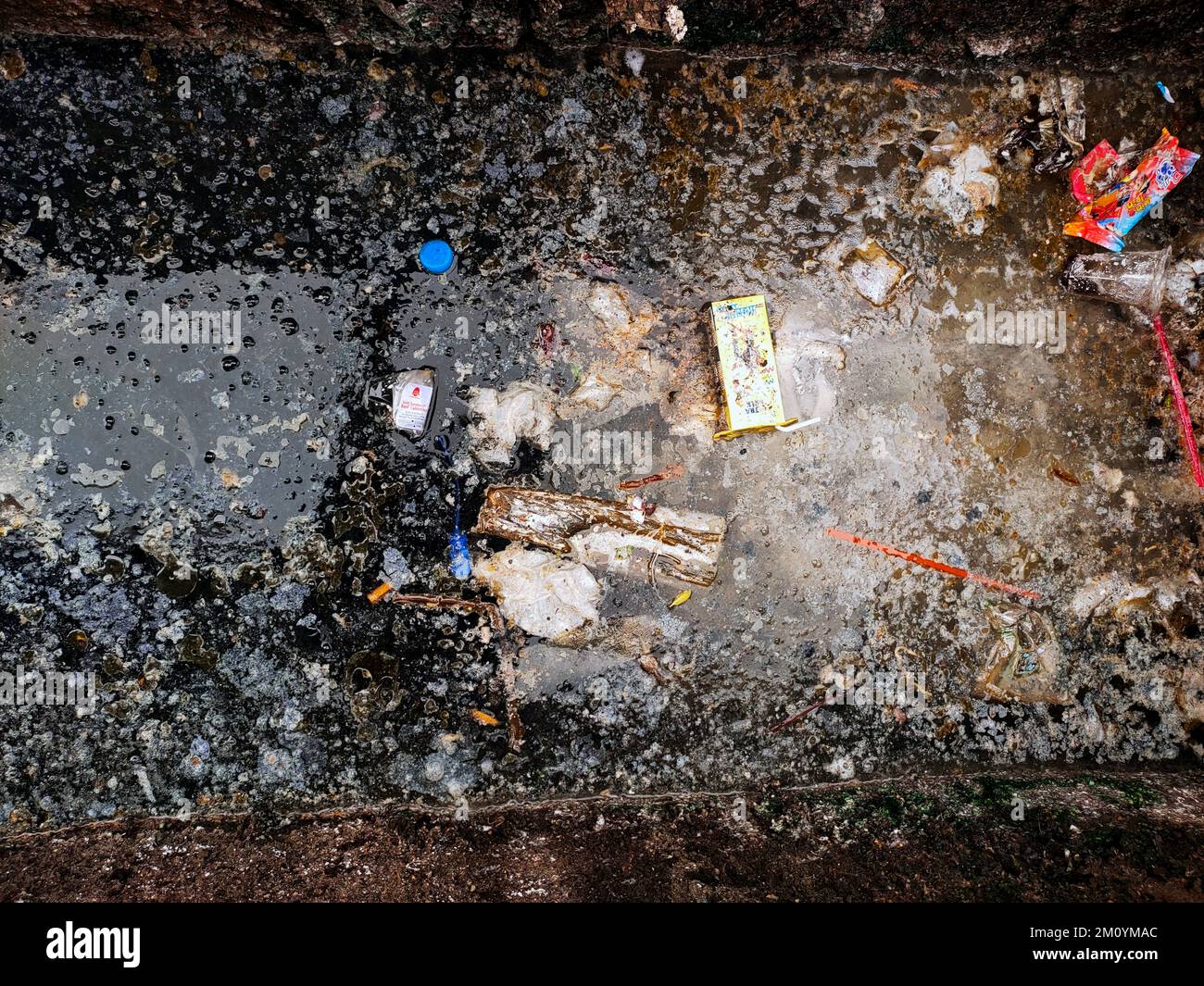Jakarta, Indonesia-Dec 5, 2022: Drains full of garbage. Urban pollution. Waste treatment. Stock Photo