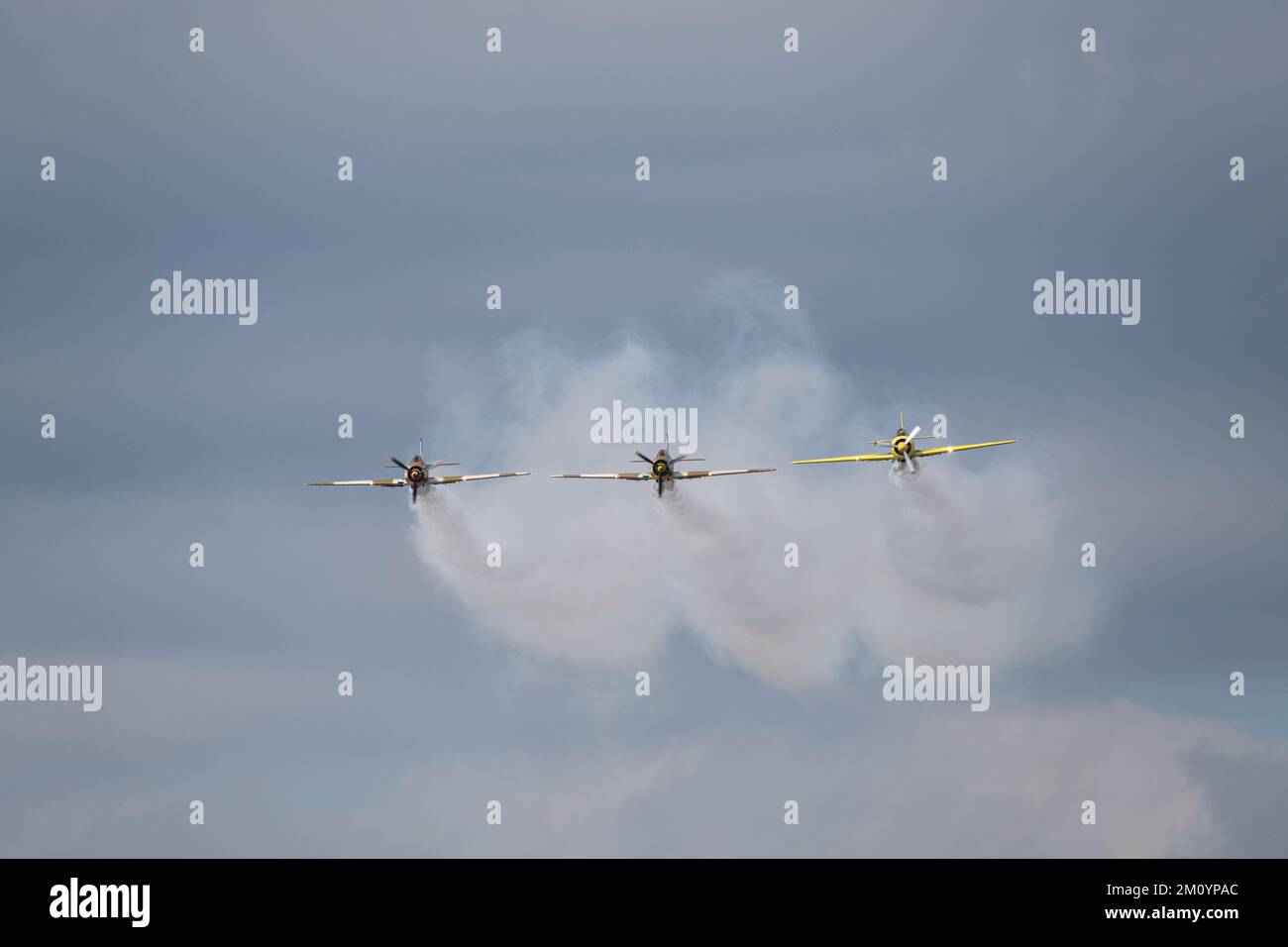 A view of airplanes flying in sky during airshow Stock Photo - Alamy