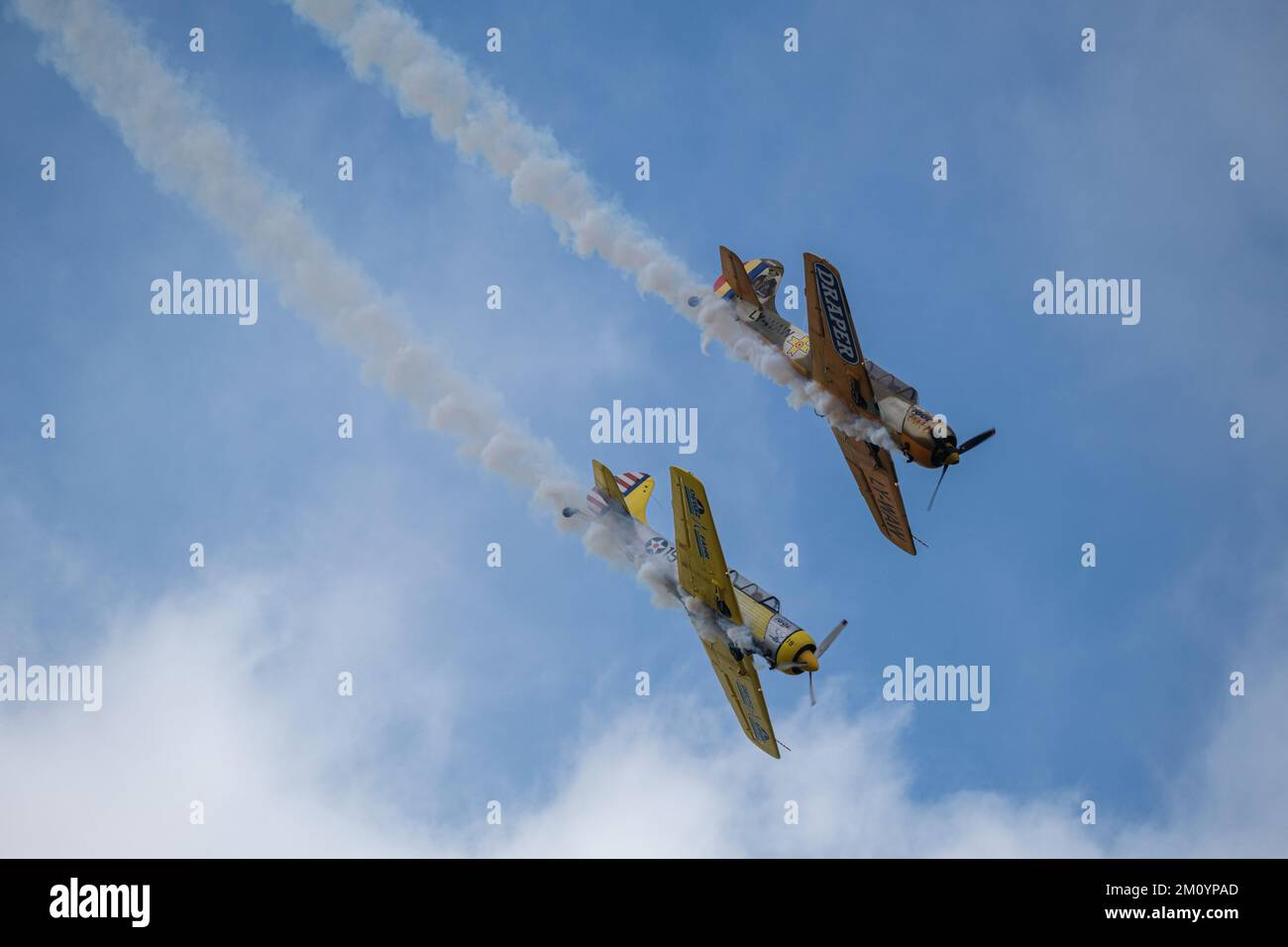 A view of airplanes flying in sky during airshow Stock Photo - Alamy