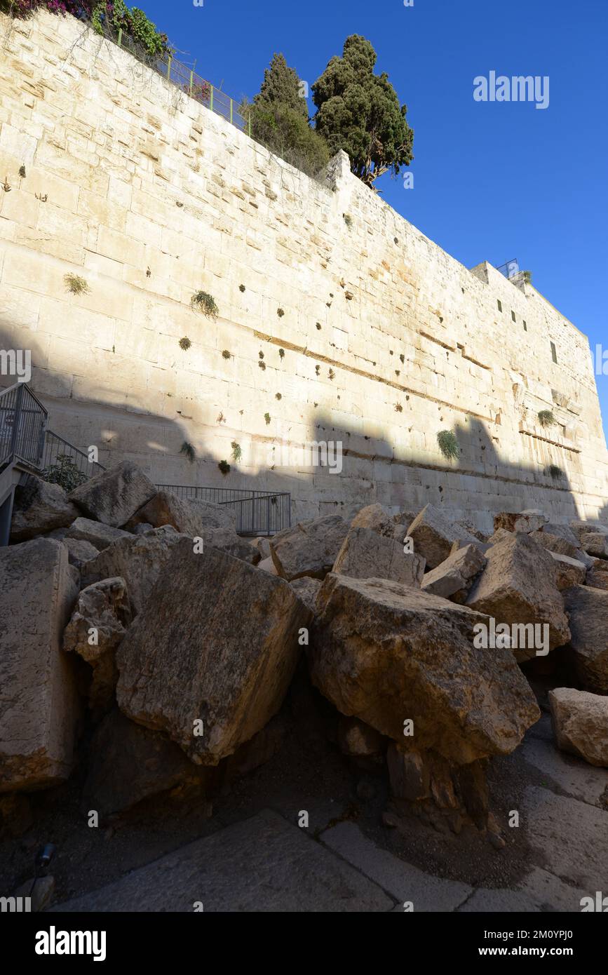 Looking up at the Western wall of the Temple mount above the Herodian ...