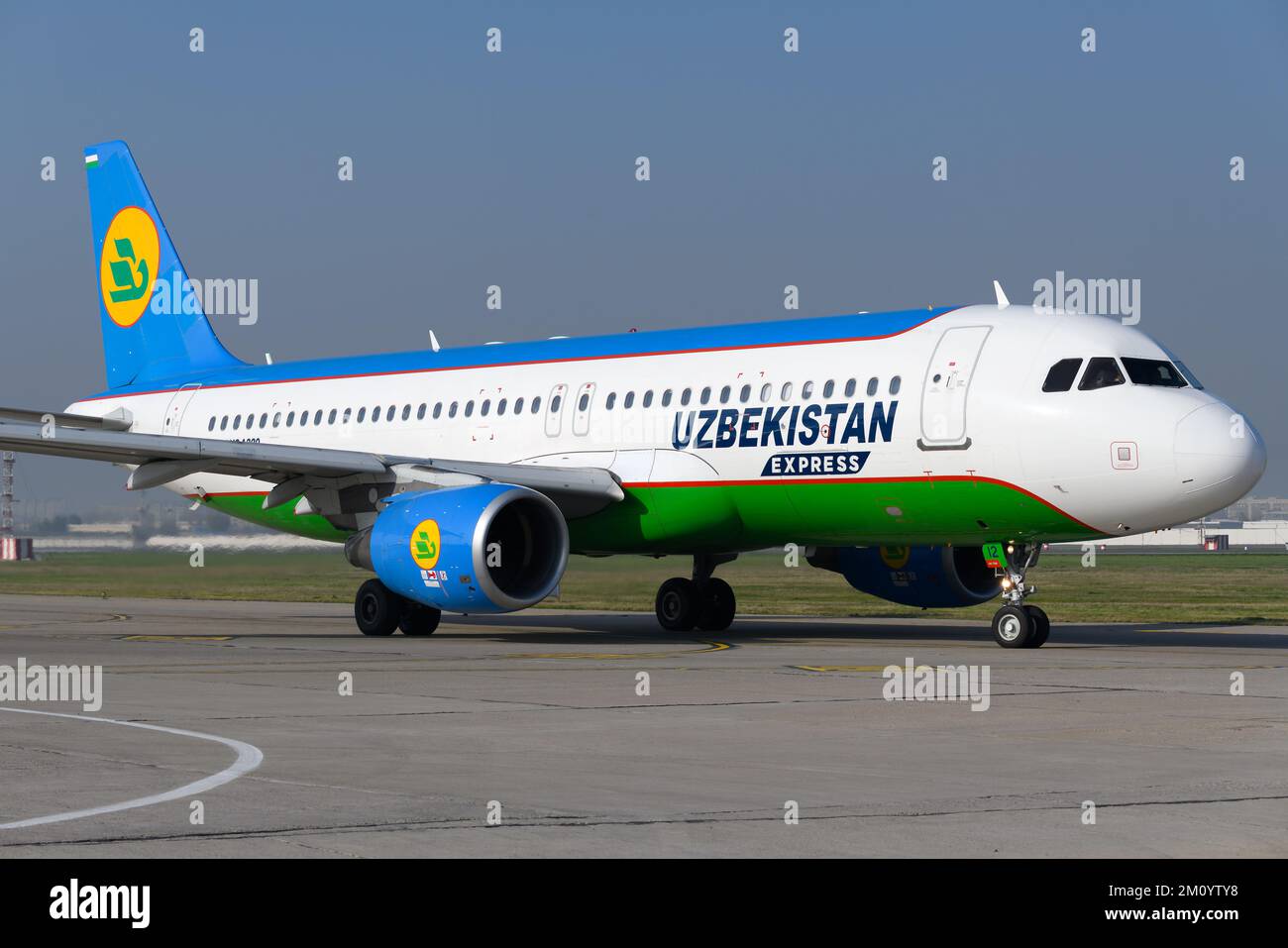 Uzbekistan Airways Express Airbus A320 airplane taxiing at Tashkent Airport in Uzbekistan. Aircraft of Uzbekistan Express. Plane registered as UK32012 Stock Photo