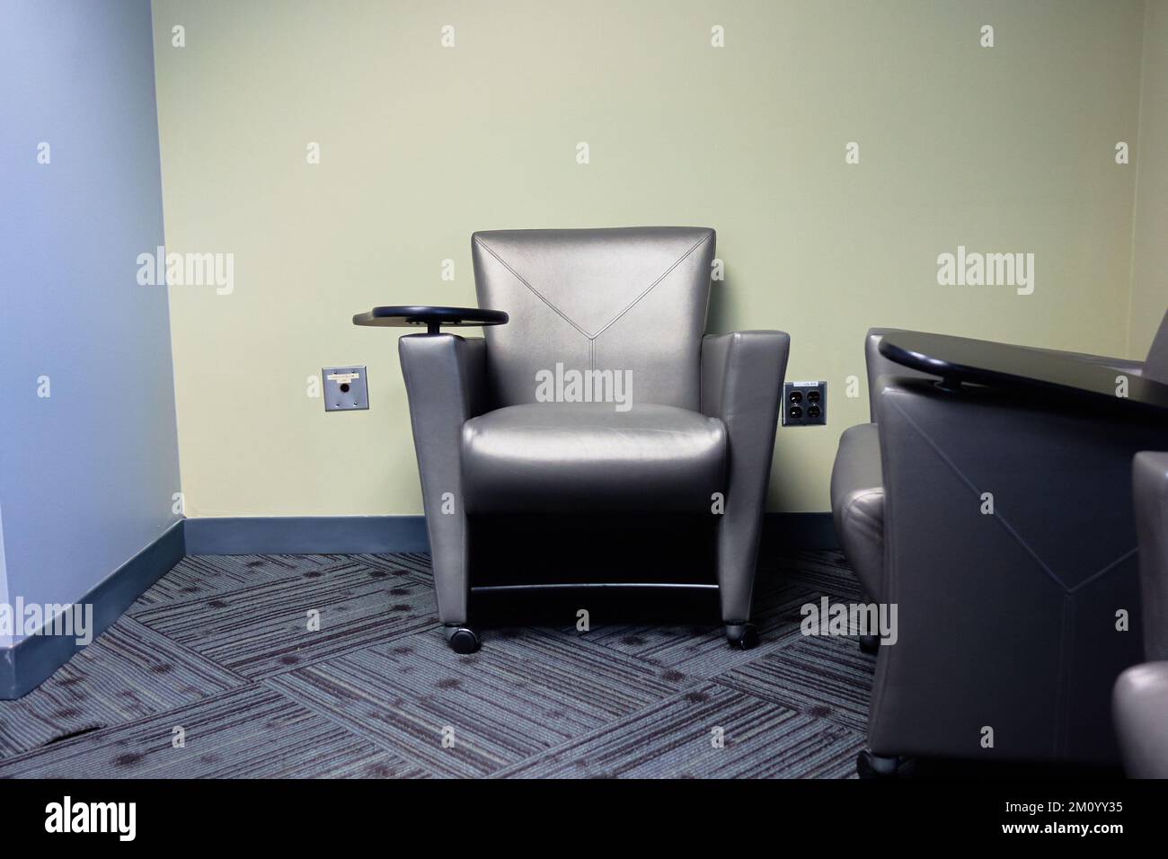 grey office chair carpet grey wall leather chair Stock Photo Alamy