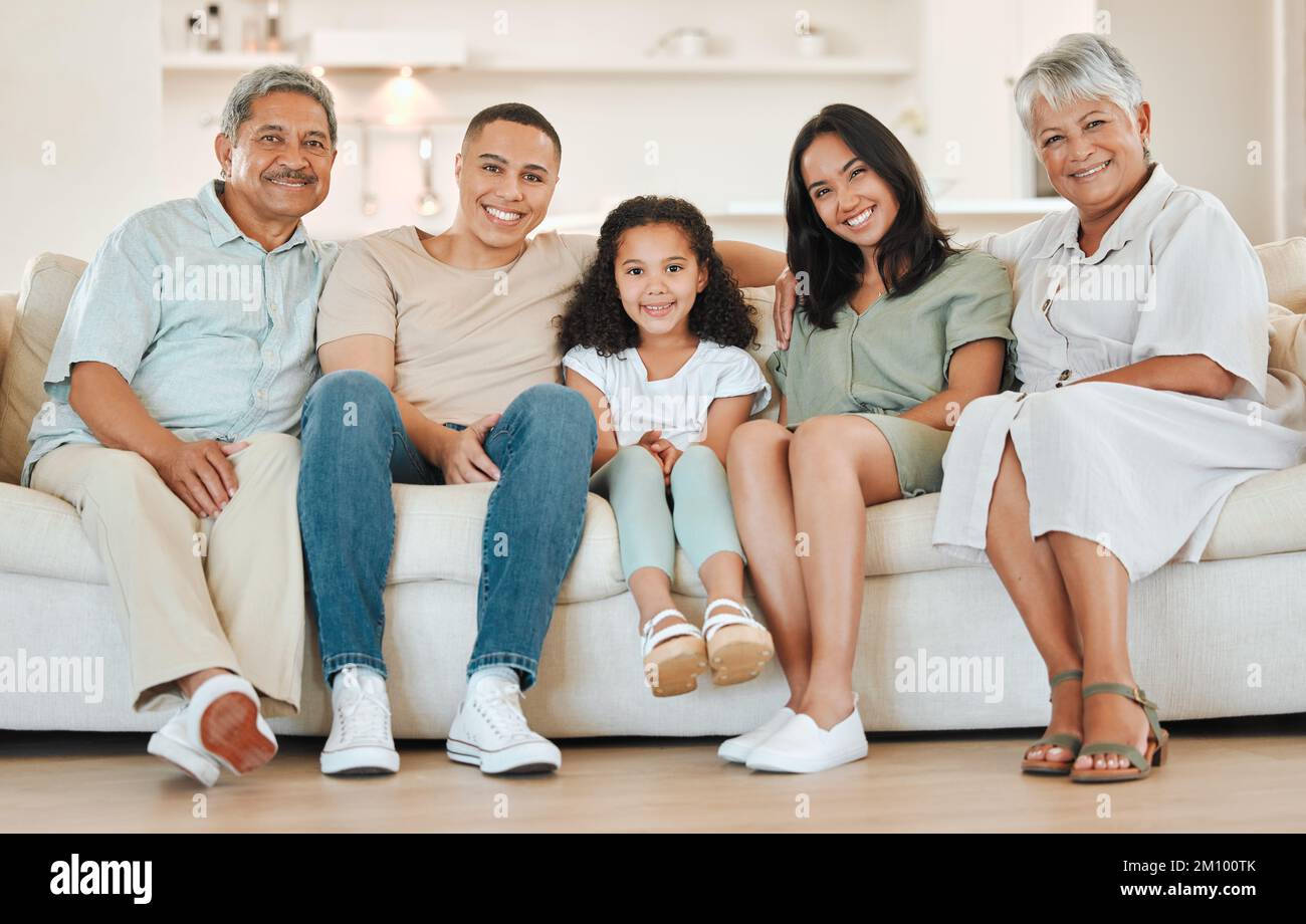 Bonded for life. a beautiful family bonding on a sofa at home. Stock Photo