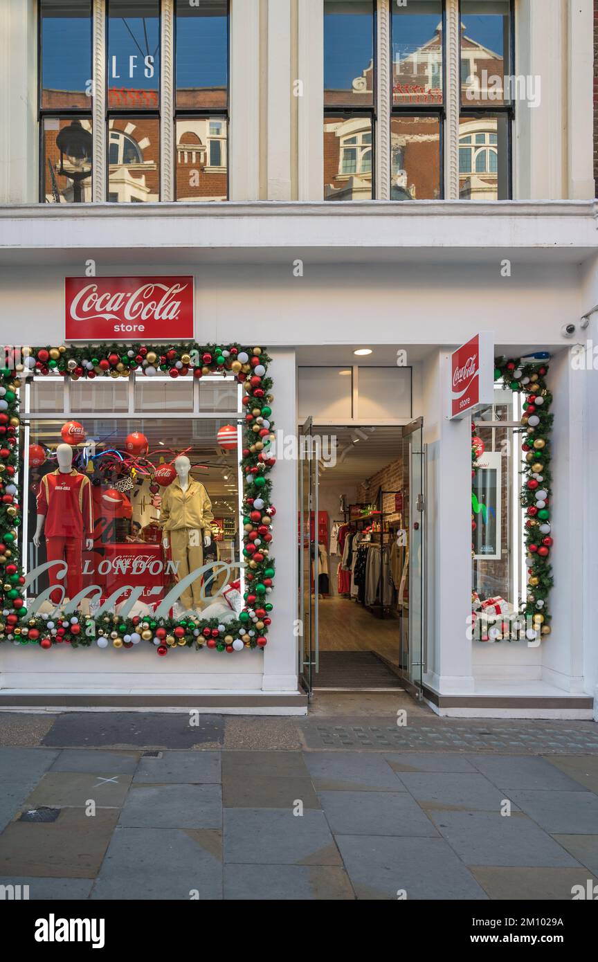 Shopfront of the Coca Cola store with Christmas decorations. Covent