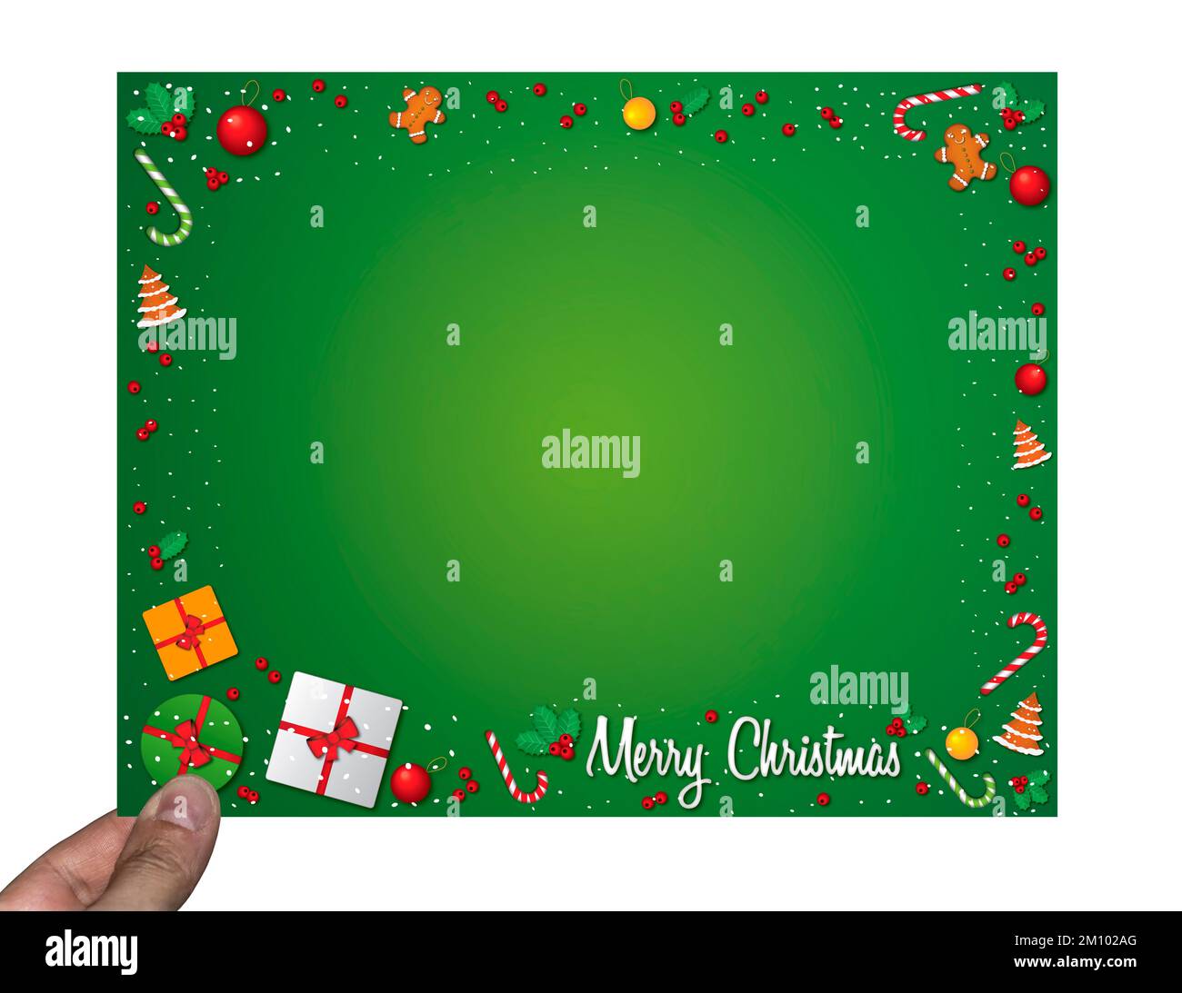 Hand holding a Christmas card Stock Photo - Alamy