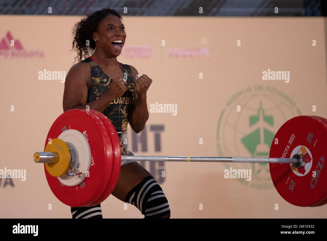 Bogota, Colombia. 8th Dec, 2022. Alvarez Caicedo Yenny Fernanda of Colombia celebrates during the womens 59 kg event at the 2022 World Weightlifting Championships in Bogota, Colombia, on Dec