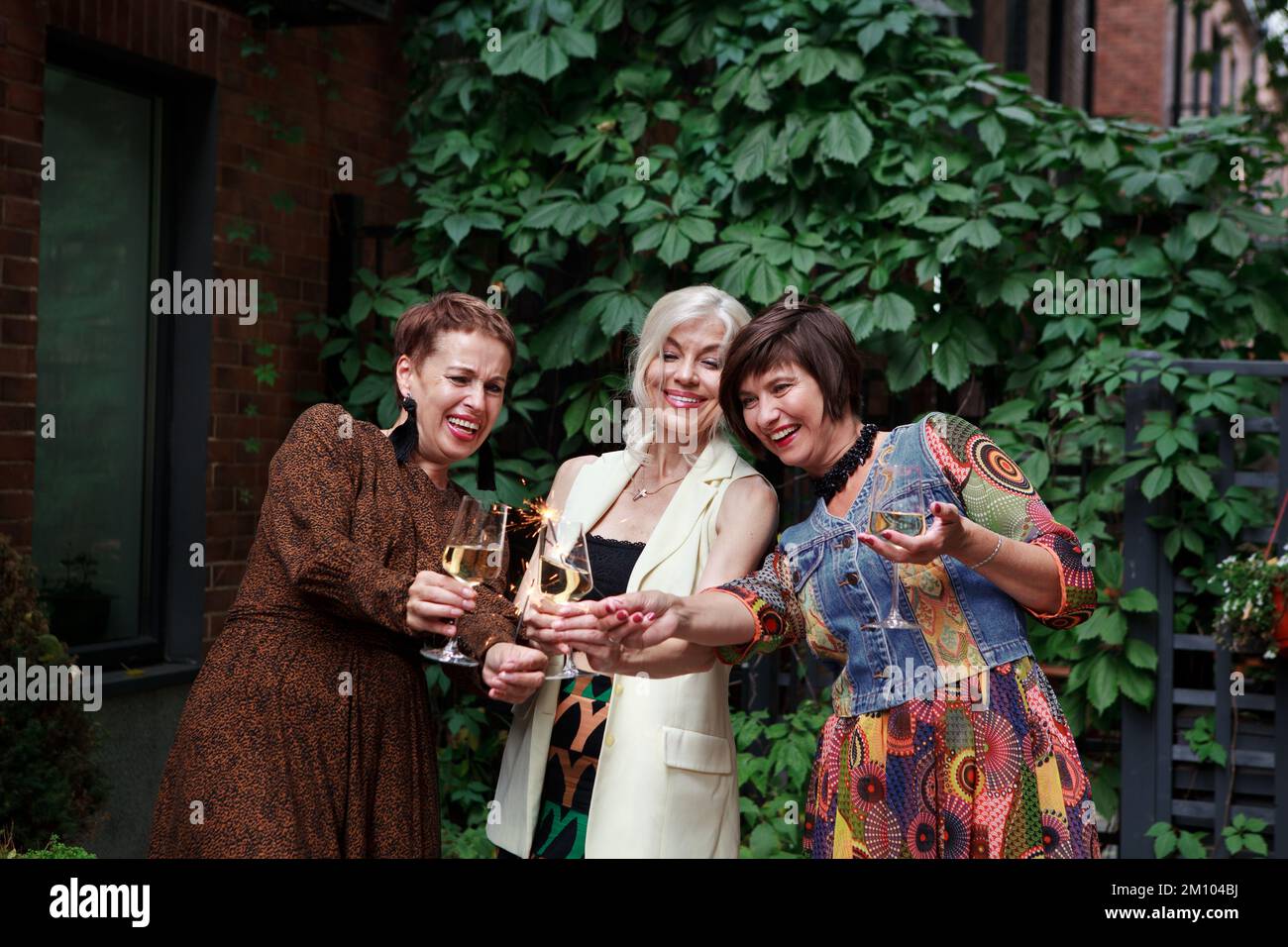 Outdoor party mature hi-res stock photography and images - Alamy