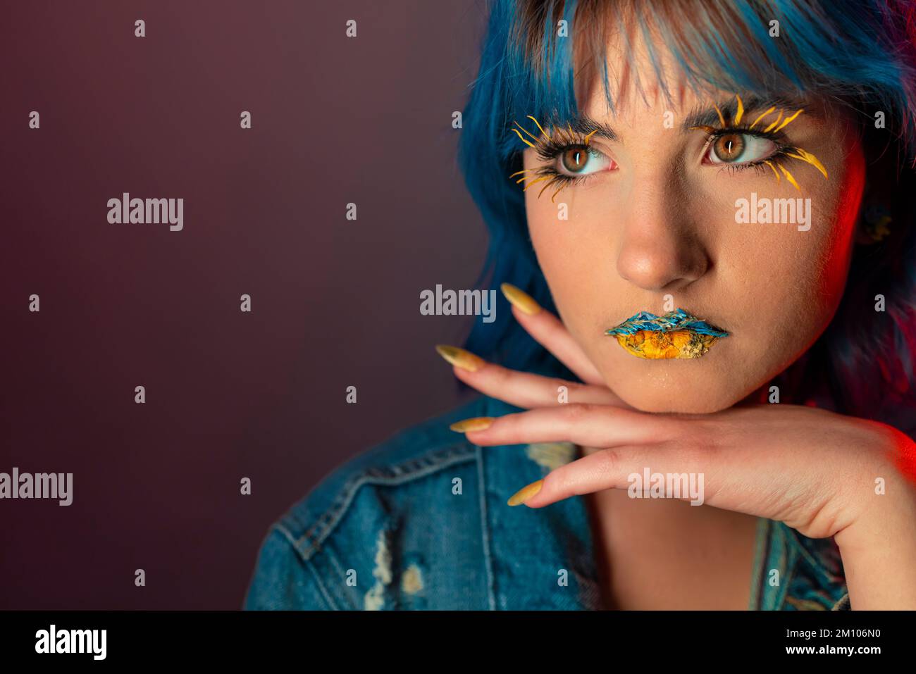 Woman in blue and yellow tones Stock Photo