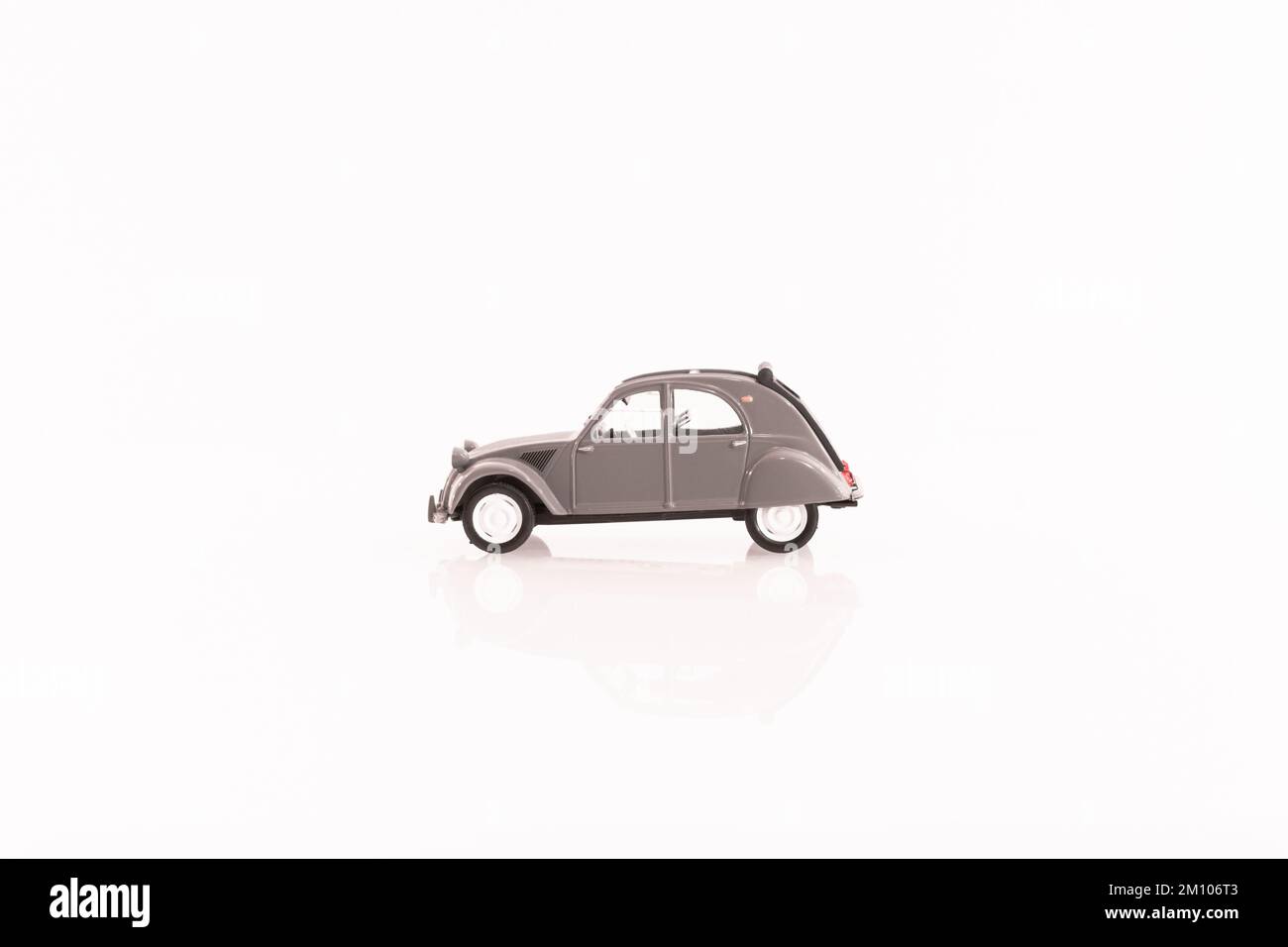 https://c8.alamy.com/comp/2M106T3/vintage-citroen-2cv-miniature-vehicle-in-metal-2M106T3.jpg