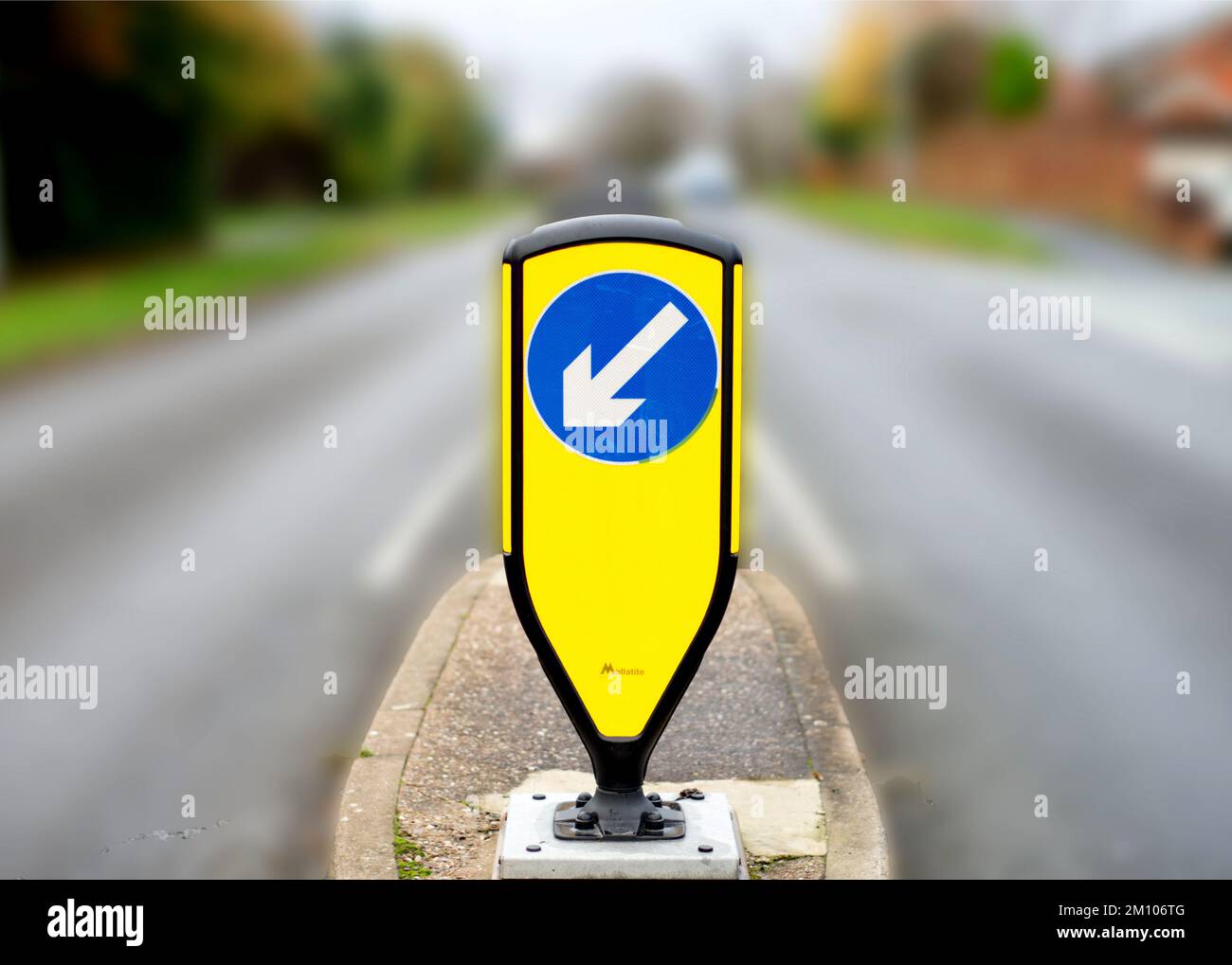 A keep left road sign on a central reservation island Stock Photo