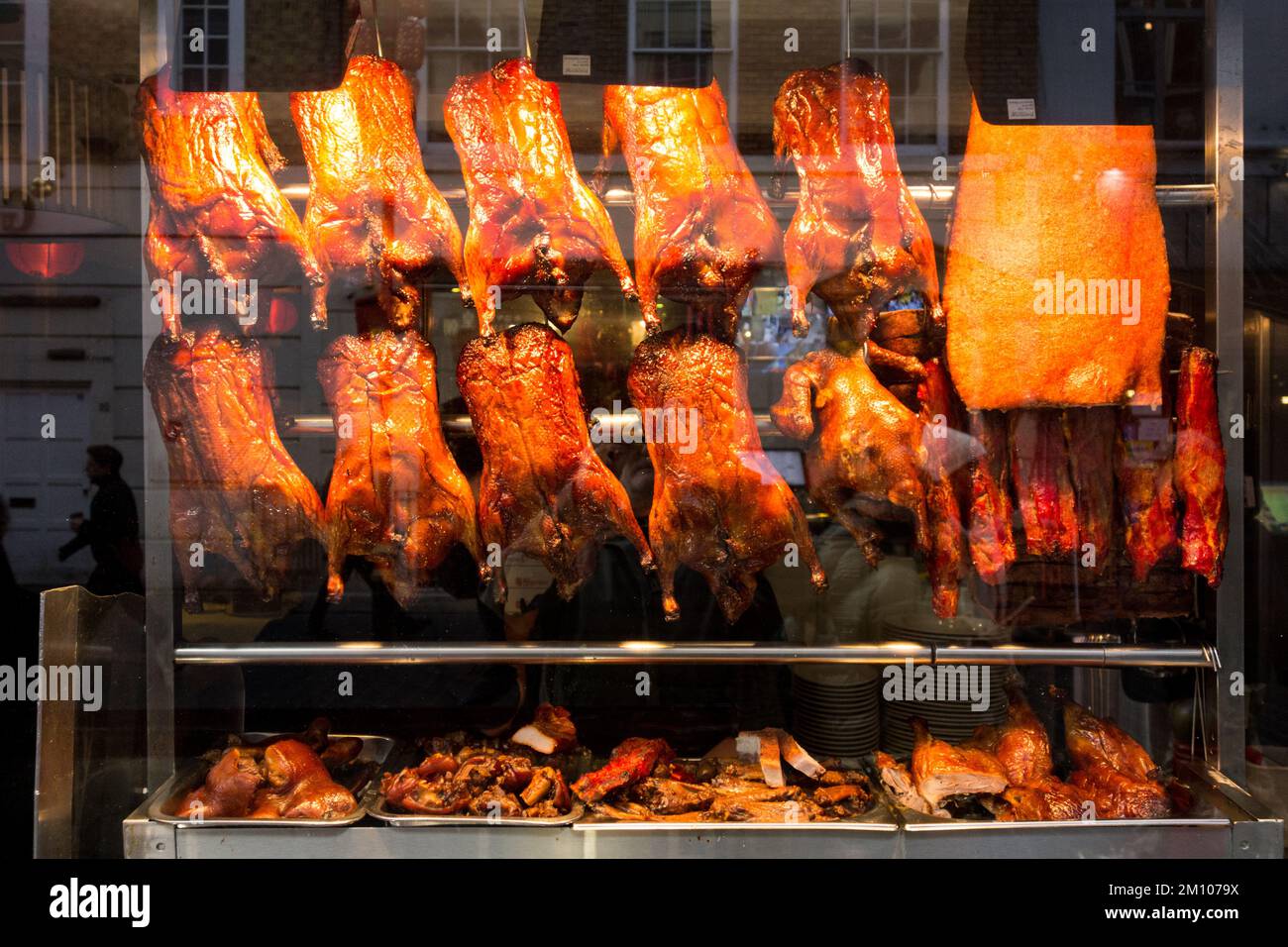 Aromatic Chinese crispy duck on display in a shop window in China Town,Soho, London, England, UK. Stock Photo