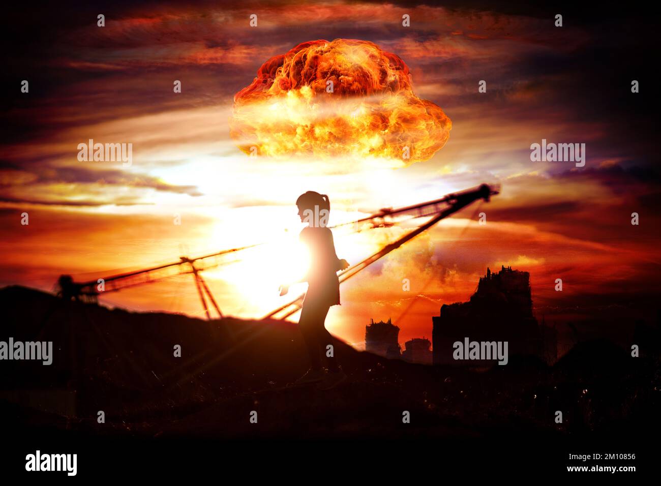 a child against the background of a nuclear explosion and a destroyed ...