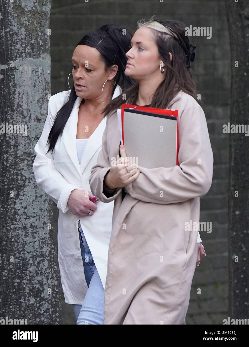 Lisa Garner (left) arrives at Portsmouth Crown Court for sentencing after giving a guilty plea to being in charge of a dog that mauled a three-year-old girl. The incident happened in the street where the defendant lives, Botley Drive, Havant, Hampshire, on August 8. Picture date: Friday December 9, 2022. Stock Photo