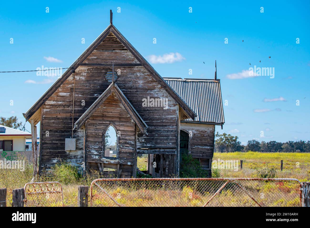 An old abandoned timber church at the village of Goodooga in outback New South Wales, Australia Stock Photo